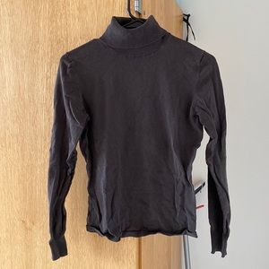 Brown Turtleneck. Great for a basic closet staple